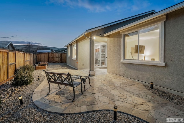 view of patio featuring a fenced backyard