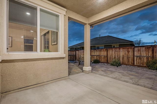 view of patio with fence