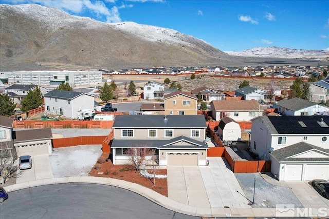 bird's eye view featuring a residential view and a mountain view