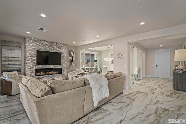 living room with marble finish floor, recessed lighting, visible vents, a large fireplace, and baseboards