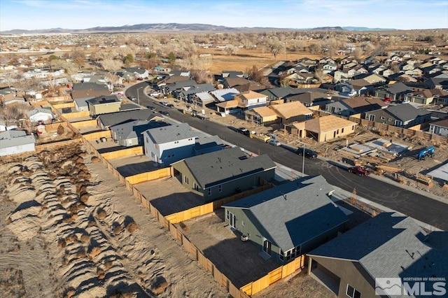 aerial view featuring a residential view and a mountain view