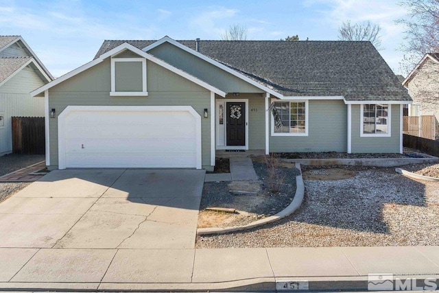 ranch-style house featuring driveway, an attached garage, fence, and a shingled roof