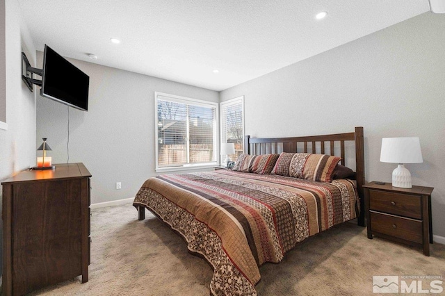 carpeted bedroom with recessed lighting and baseboards