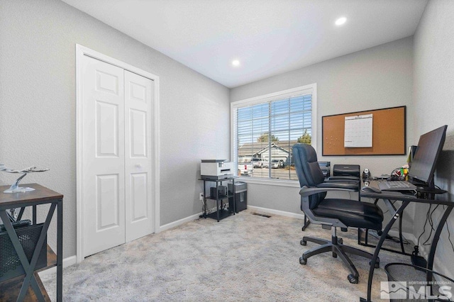 carpeted office space with recessed lighting and baseboards