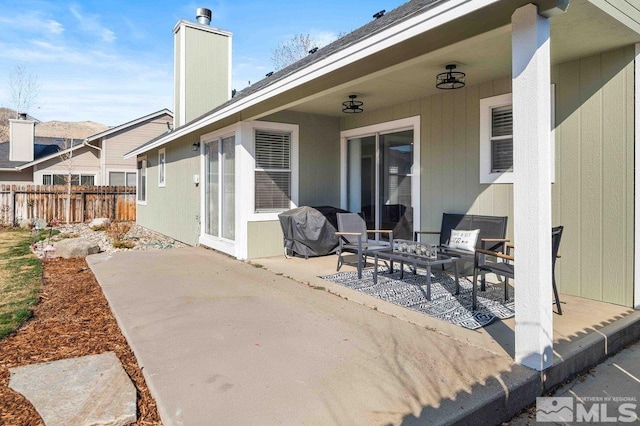 view of patio / terrace featuring fence and area for grilling