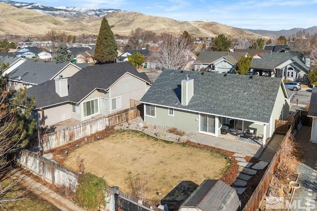 aerial view featuring a residential view and a mountain view