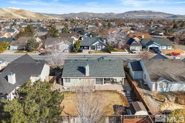 bird's eye view with a residential view and a mountain view