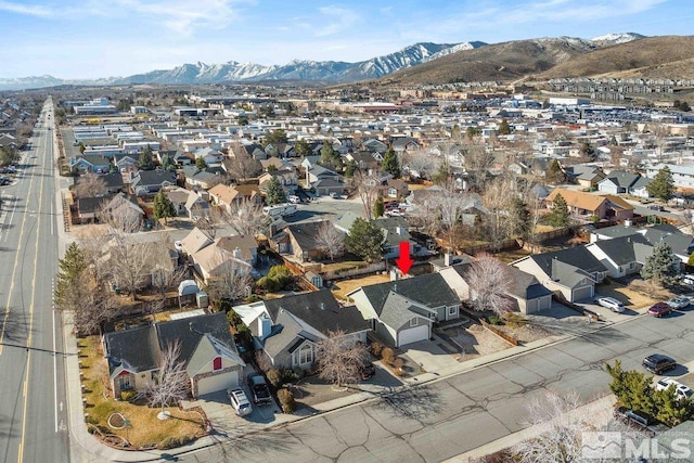 bird's eye view featuring a mountain view and a residential view