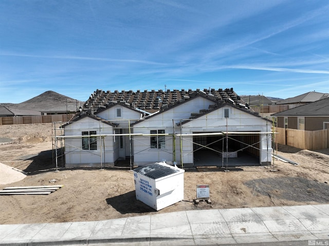 property under construction with fence