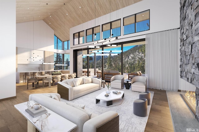 living room featuring wooden ceiling, high vaulted ceiling, and wood finished floors