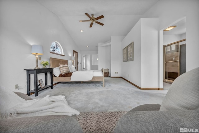 carpeted bedroom featuring high vaulted ceiling and baseboards