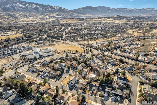 birds eye view of property featuring a residential view and a mountain view