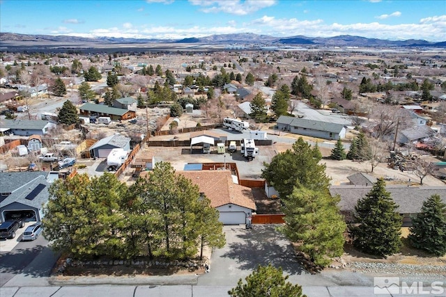 aerial view with a mountain view and a residential view