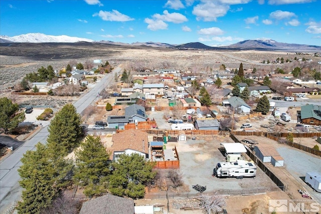 drone / aerial view with a mountain view and a residential view