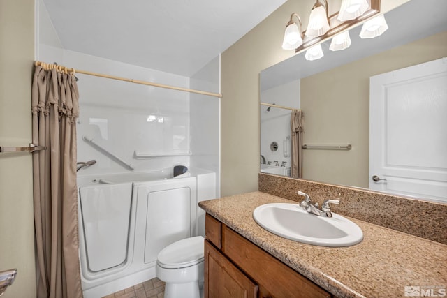 bathroom with toilet, shower / tub combo with curtain, and vanity