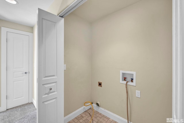 washroom with electric dryer hookup, baseboards, hookup for a washing machine, and laundry area