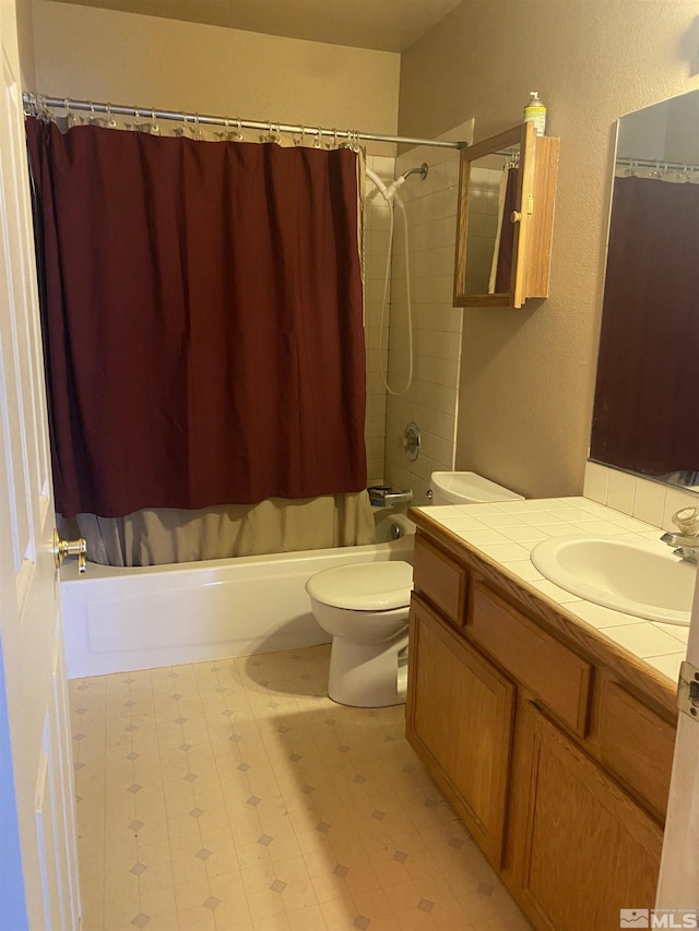 full bathroom featuring tile patterned floors, shower / bath combination with curtain, toilet, and vanity