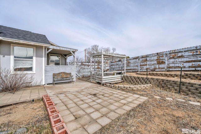 view of patio with fence