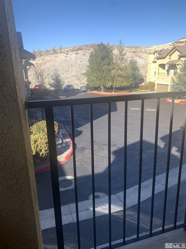 balcony featuring a mountain view