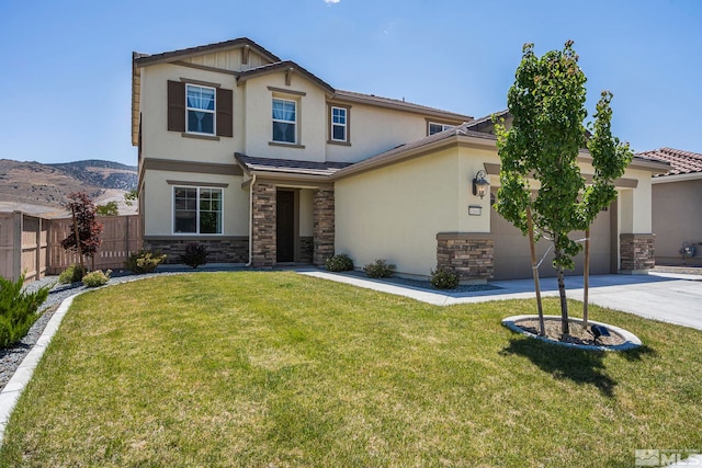 view of front of home with fence, driveway, an attached garage, stucco siding, and a front lawn