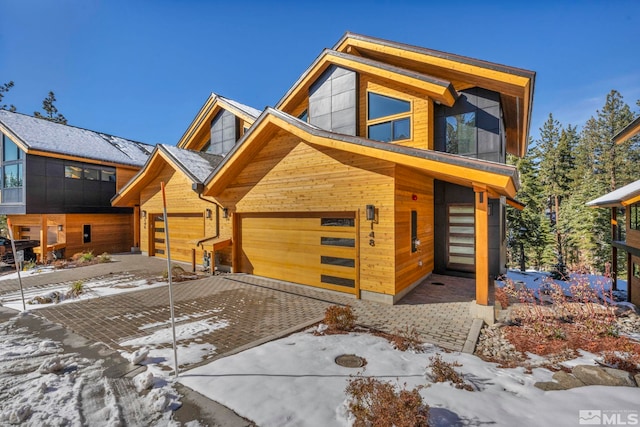 modern home featuring a garage