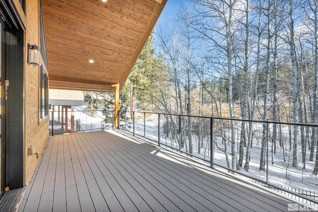 view of snow covered deck