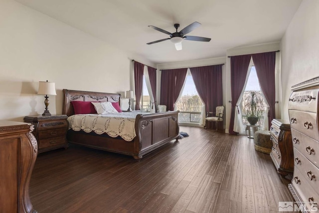 bedroom featuring a ceiling fan and dark wood-style flooring