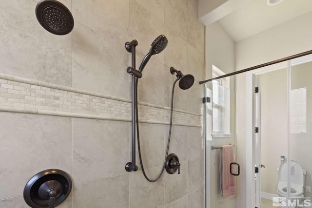 interior details with a shower stall