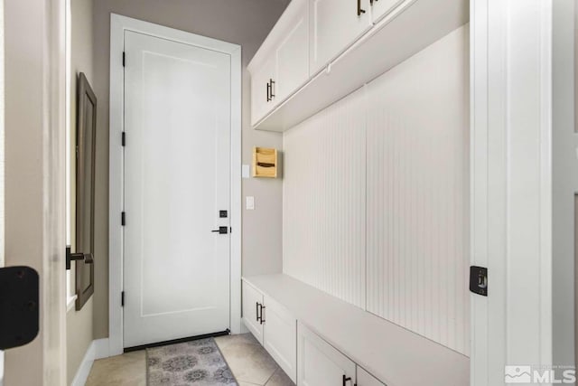 mudroom featuring light tile patterned flooring