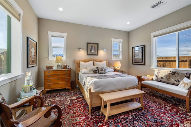 bedroom with recessed lighting and visible vents