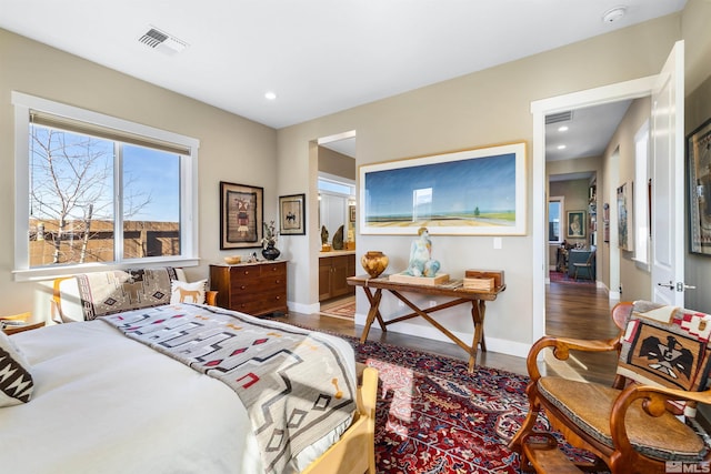 bedroom featuring visible vents, recessed lighting, baseboards, and wood finished floors