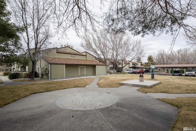 exterior space with a front yard