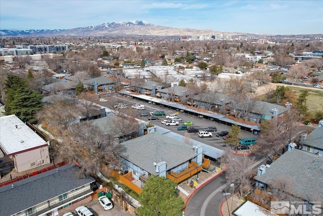 drone / aerial view featuring a mountain view and a residential view
