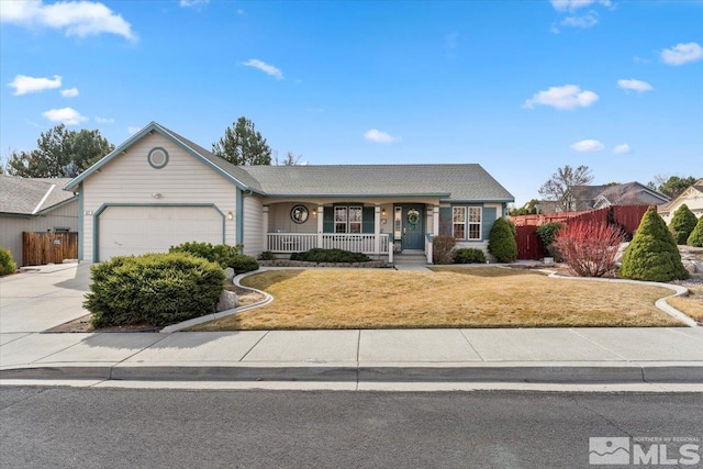 ranch-style home featuring fence, covered porch, concrete driveway, an attached garage, and a front yard