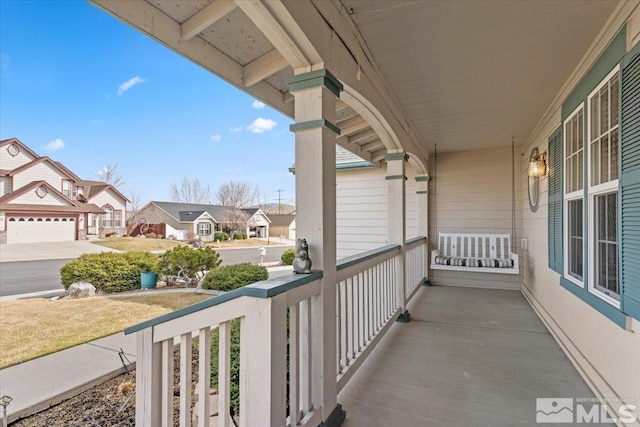 balcony with a porch and a residential view