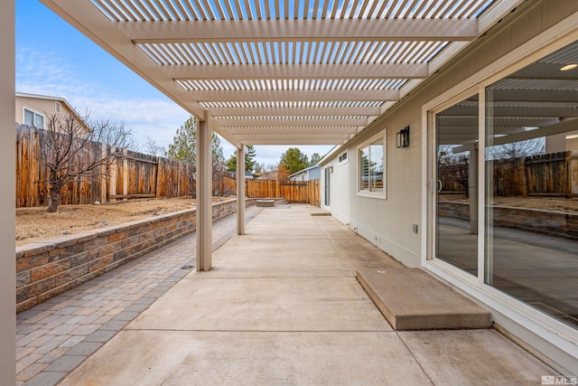 view of patio with a fenced backyard and a pergola