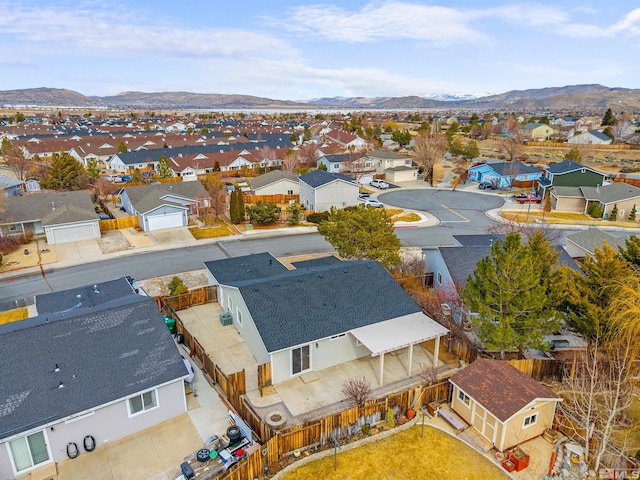 bird's eye view featuring a mountain view and a residential view