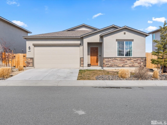 ranch-style house featuring concrete driveway, an attached garage, fence, and stone siding