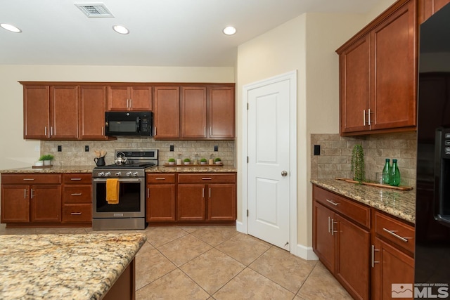 kitchen with light tile patterned floors, light stone countertops, visible vents, recessed lighting, and black appliances