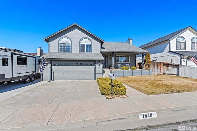 view of front of home with a porch, fence, roof with shingles, concrete driveway, and a garage