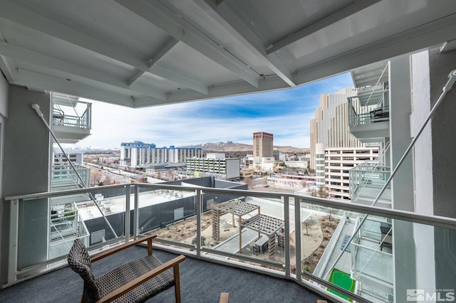 balcony featuring a view of city