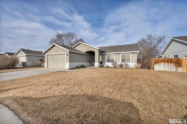 ranch-style house featuring stucco siding, driveway, fence, a front yard, and a garage