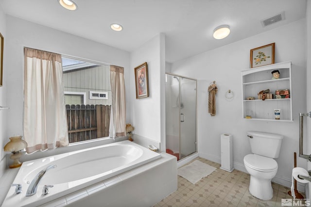 full bathroom featuring visible vents, toilet, a stall shower, and a bath