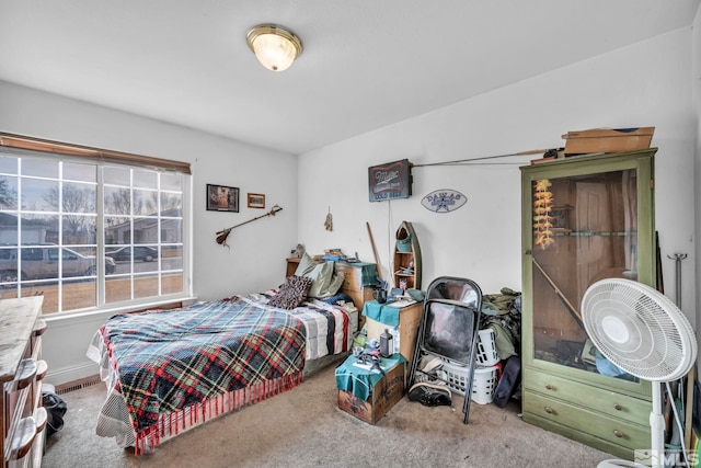 carpeted bedroom with visible vents