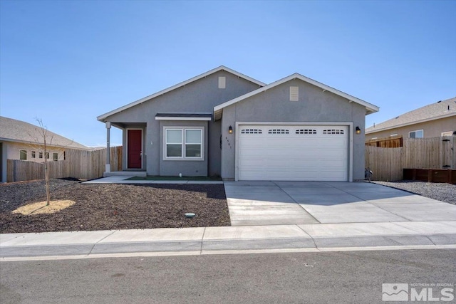 single story home featuring concrete driveway, fence, a garage, and stucco siding