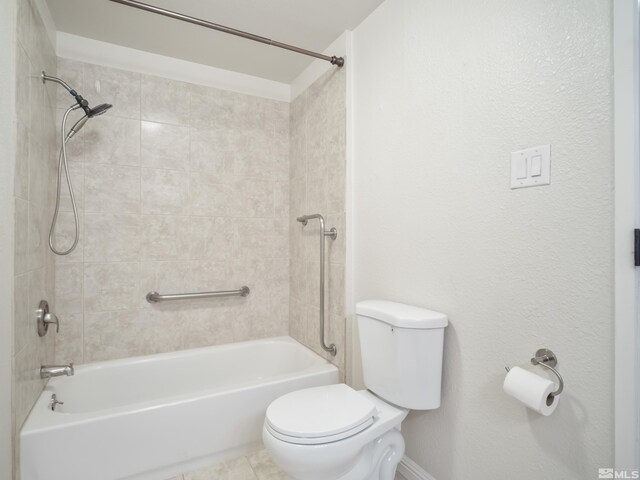 bathroom featuring toilet and shower / bathing tub combination