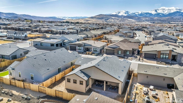 birds eye view of property with a residential view and a mountain view