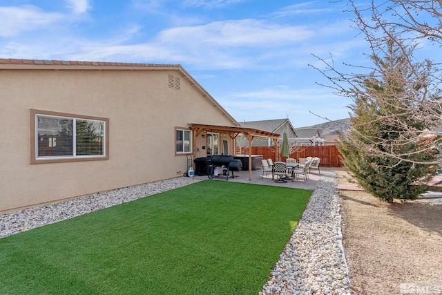 view of yard with a fenced backyard and a patio