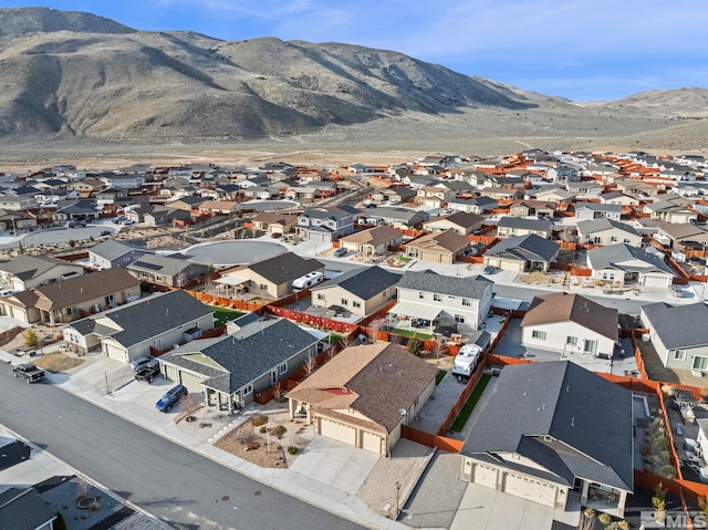 aerial view with a mountain view and a residential view