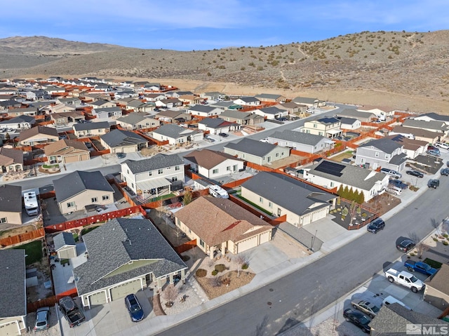 birds eye view of property with a residential view